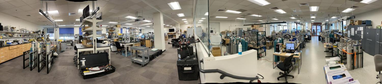 Panorama of the INSTAAR Stable Isotope Lab showing mass spectrometers, preparation stations, gas cylinders, computers, and more
