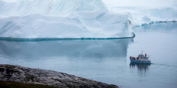   An iceberg in Ilulissat, Greenland. Ice sheets in Greenland and Antarctica are melting rapidly, and that melt will accelerate as the Earth heats up. Ryan Kellman/NPR