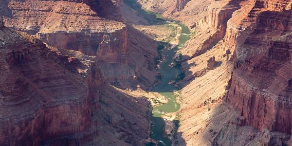 The Colorado River flowing through the Grand Canyon on its way to Lake Mead. Bas Vermolen/Getty Images.