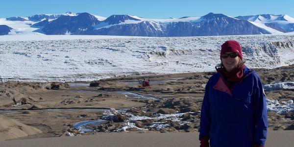 Bundled up against the cold, Diane McKnight stands near Cotton Glacier.