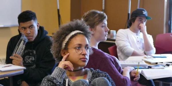 A diverse group of students studying chemistry in the Student Academic Success Center at CU Boulder