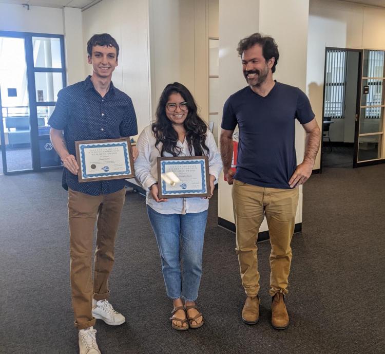 Jared Collins, Airy Peralta, and Brad Markle at the celebration of INSTAAR awards. Photo by Marisa Seitz.