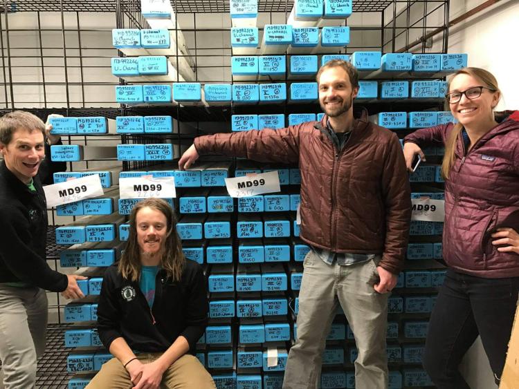 Simon Pendleton, David Harning, Chris Florian, and Sarah Crump take a break after moving a bunch of blue-capped sediment cores into a new storage rack