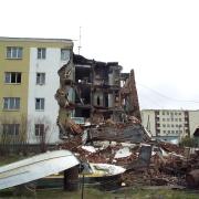 The corner of a Russian apartment building is collapsed from uneven permafrost thaw in Chersky. Photo by Vladimir Romanovsky, University of Alaska Fairbanks