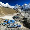Dramatic view of the village of Gorakshep (Khumjung, Nepal), with jagged icy peaks and a dark blue sky. Photo by Dylan Shaw on Unsplash  