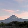 A large Andean volcano at sunset
