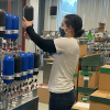 Taline Leon, undergraduate researcher, works with air samples in the INSTAAR Stable Isotope Lab. Photo by Sylvia Michel, 2022.