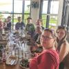 Eleven INSTAAR admin staff crowd around one very large table for lunch