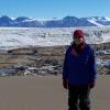 Bundled up against the cold, Diane McKnight stands near Cotton Glacier.