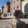 Stone globes outside the entrance to the Benson Geological Sciences building on CU Boulder campus