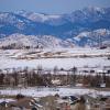 Burned neighborhood with Front Range behind