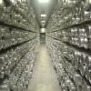 Rows and rows of silver tubes holding ice cores in an NSF freezer facility