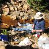 Students involved in Diane McKnight's ongoing research on water quality in the Snake River collect tracer samples along a tributary. 