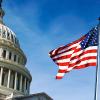 Part of the Capitol dome and a U.S.A. flag