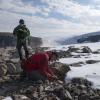 Simon Pendleton and Giff Miller collect ancient plant remains melted out of the edges of the ice cap on Baffin Island. Photo by Matt Kennedy, Earth Vision Trust.