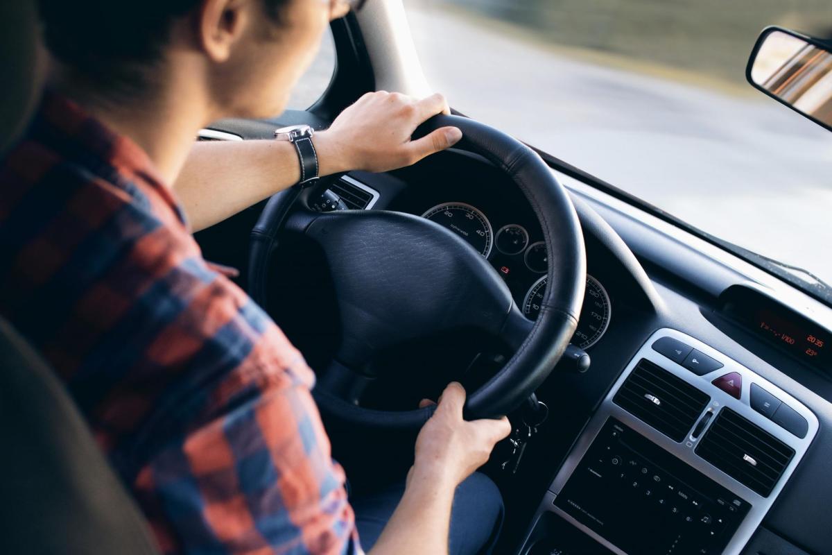 person driving a car