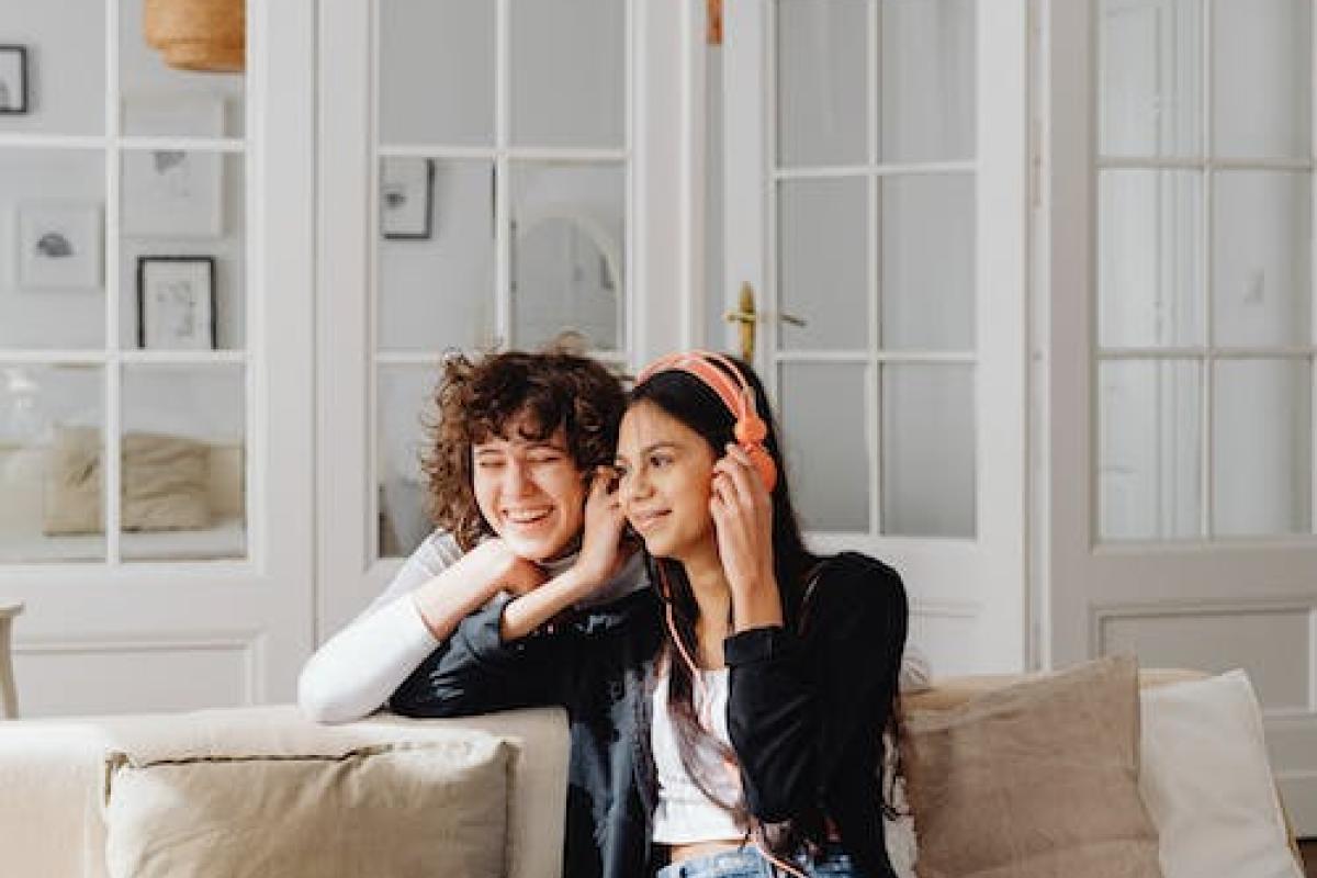 two students listening to music