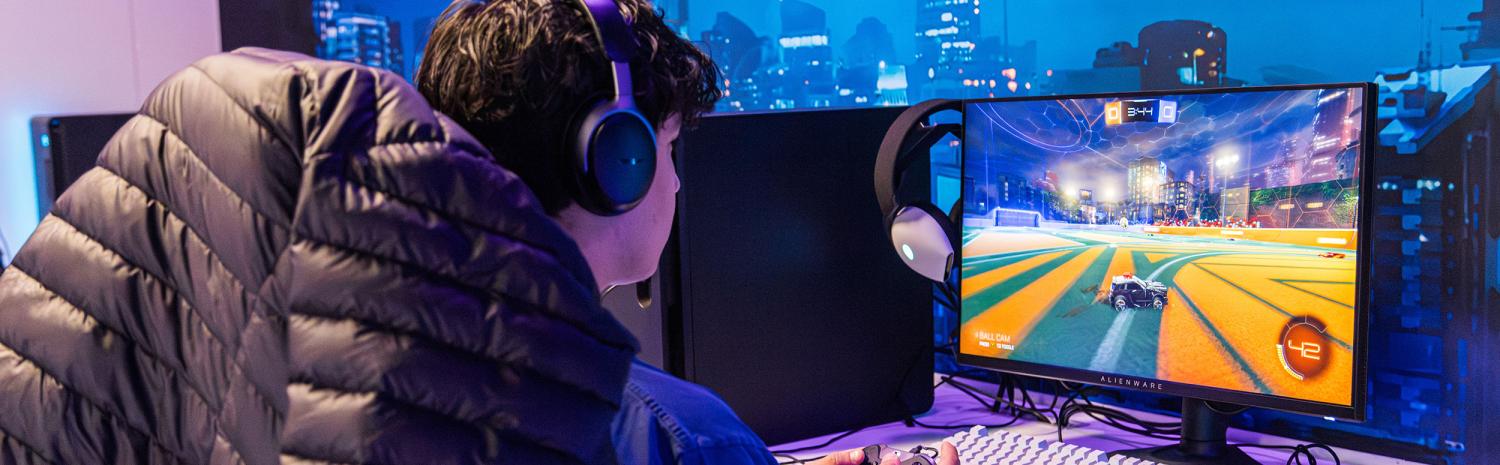 student on gaming lounge computer