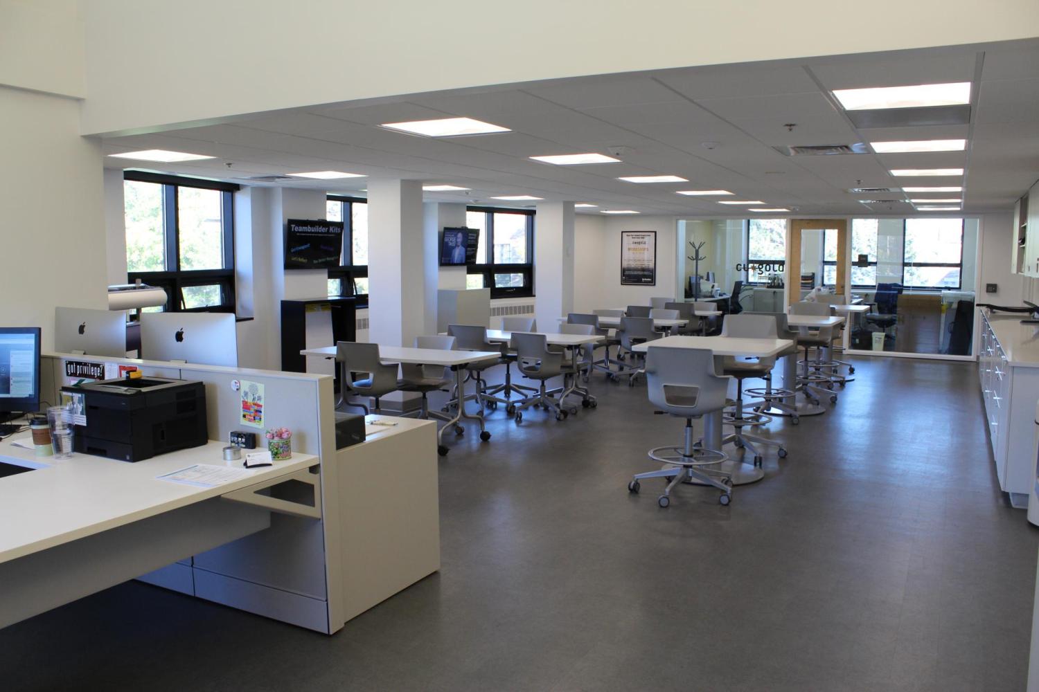 resource center tables with CU GOLD office in background