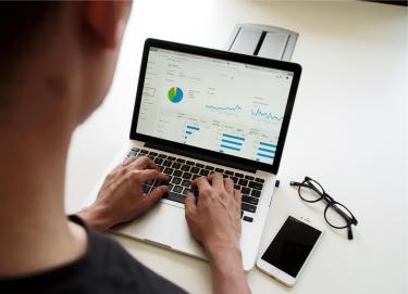 male working on a laptop