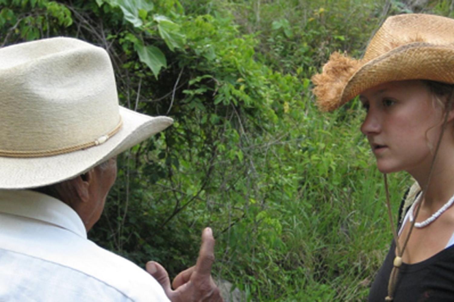 Farmer discussing life with a student