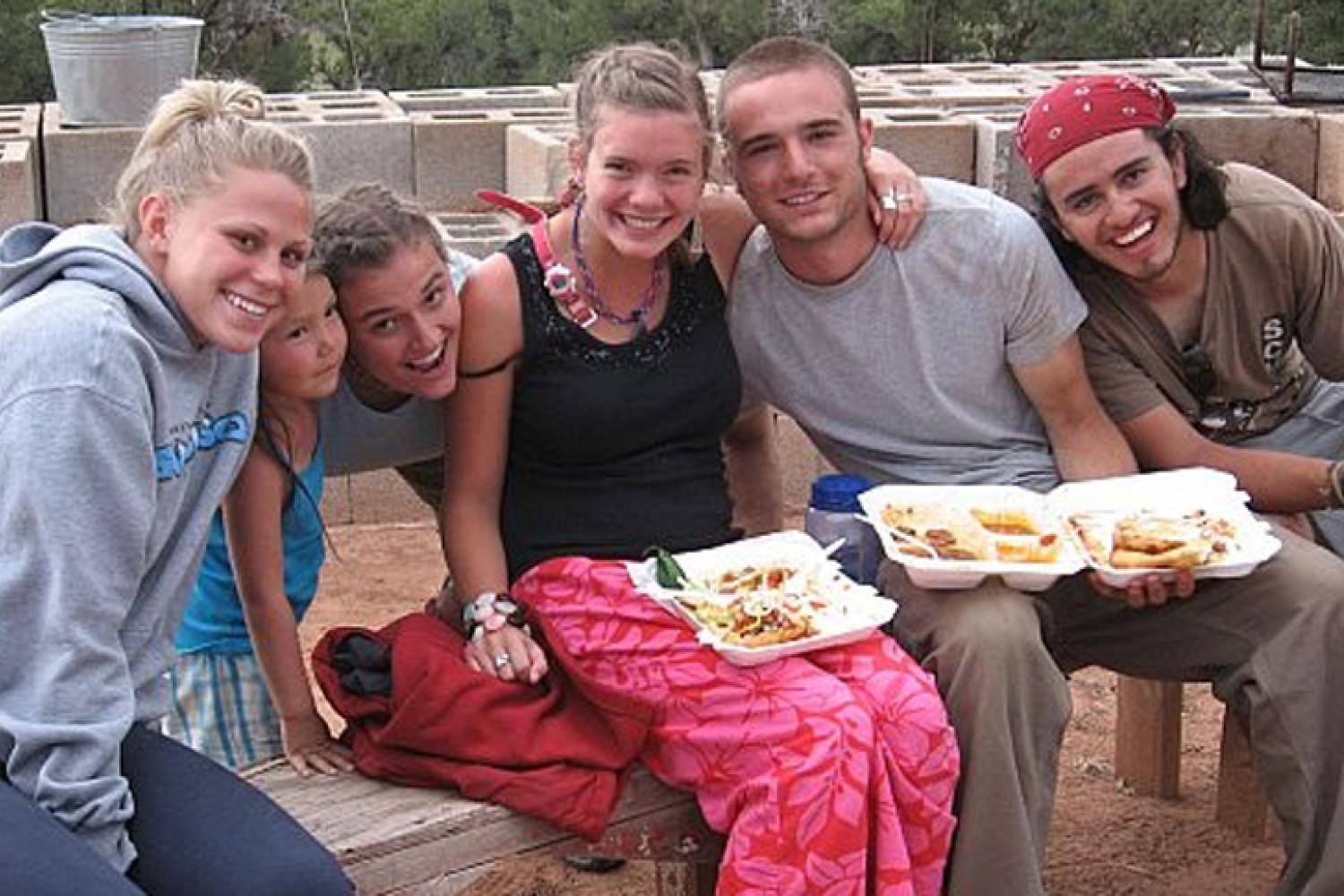 Students taking a break from construction for lunch