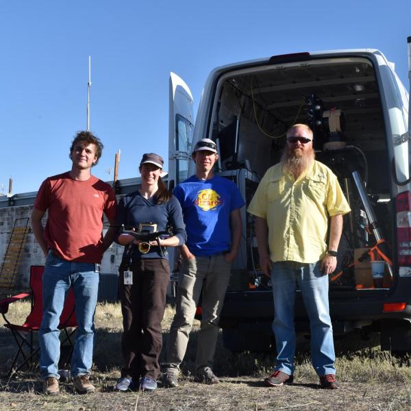 NIST researchers and CU Director of Flight Operations Dan Hesselius (far right)