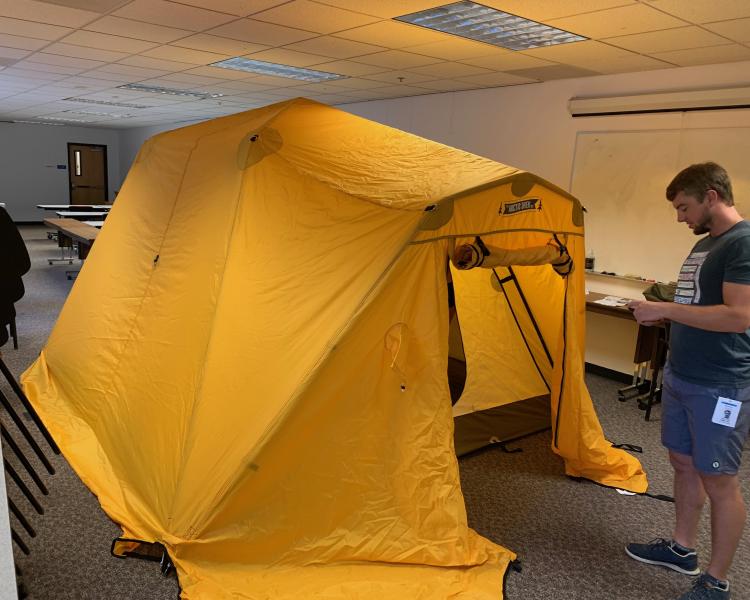 Researchers assembles tent