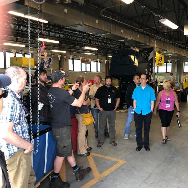 Employees inside of the Recycling center on a tour