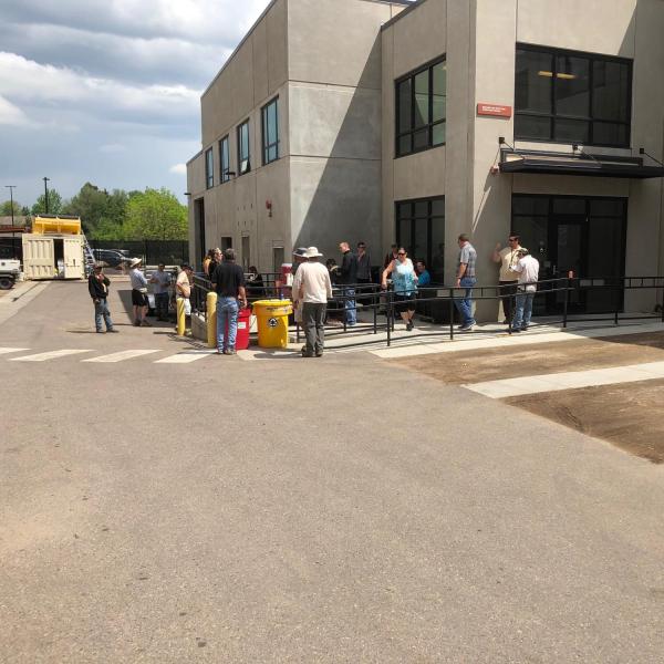 Employees grabbing food outside of the GROC
