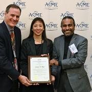 Pao being presented with her award 