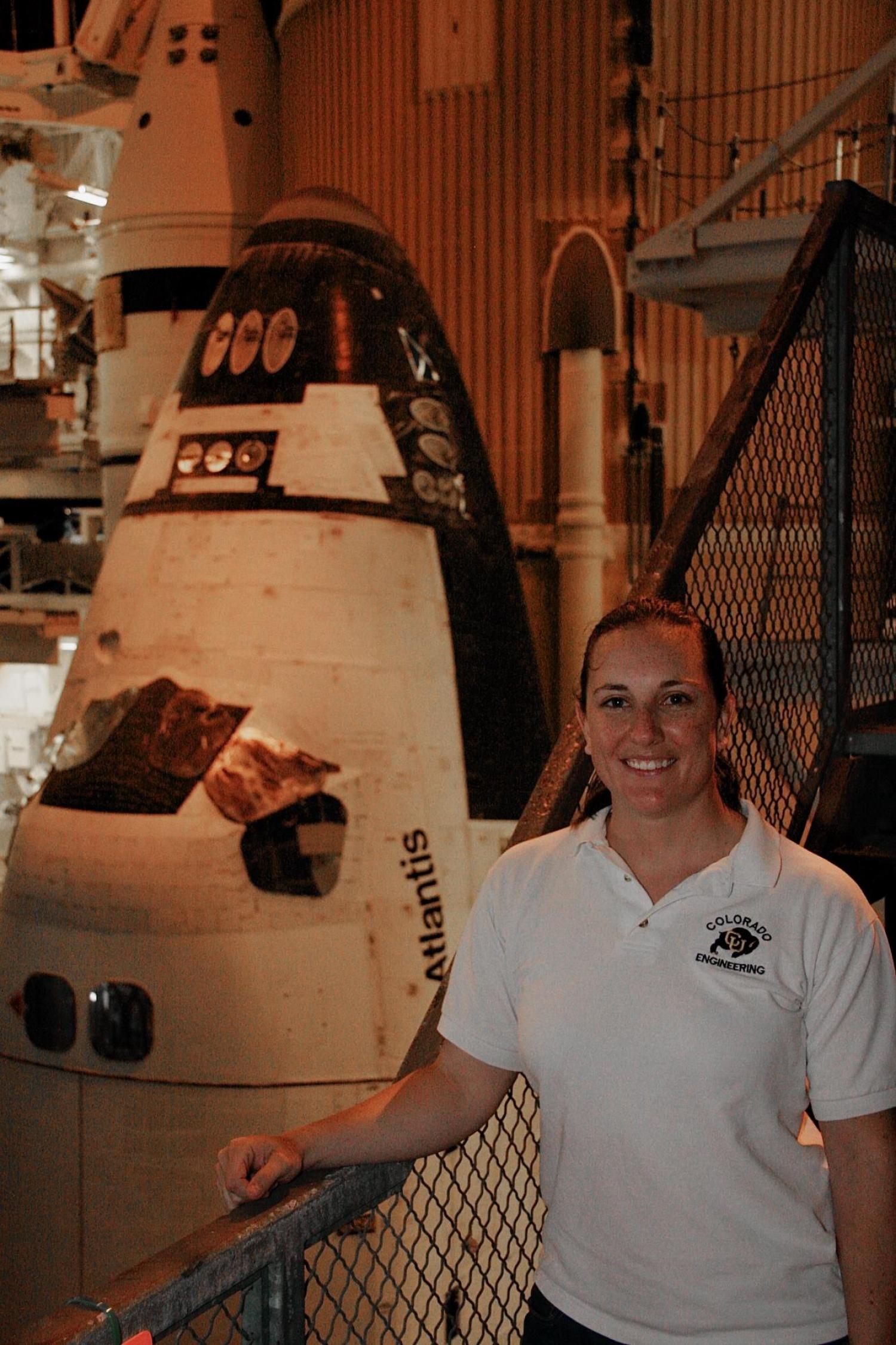 Kirk next to a shuttle craft in a hanger