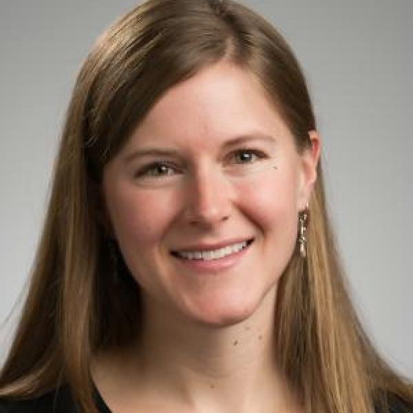 Jennifer Scheib portrait on a gray background 