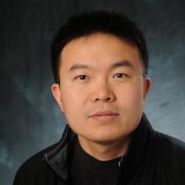 Li Shang portrait on black background 