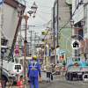 A person walking through a disaster area