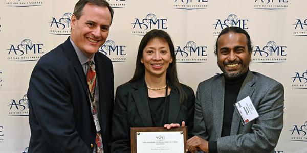 Pao receiving her award 