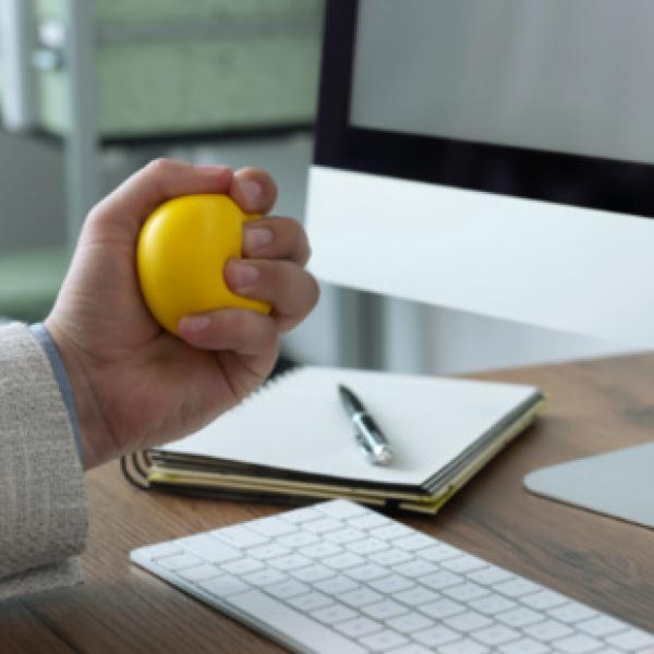 Phot of Hand Squeezing Stress Ball