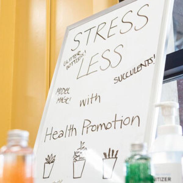 Stress Less white board sign at event