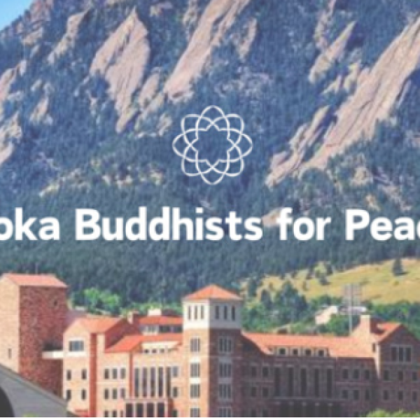University building with the Flat Irons in the background with Soka Buddhists ofr Peace over the image
