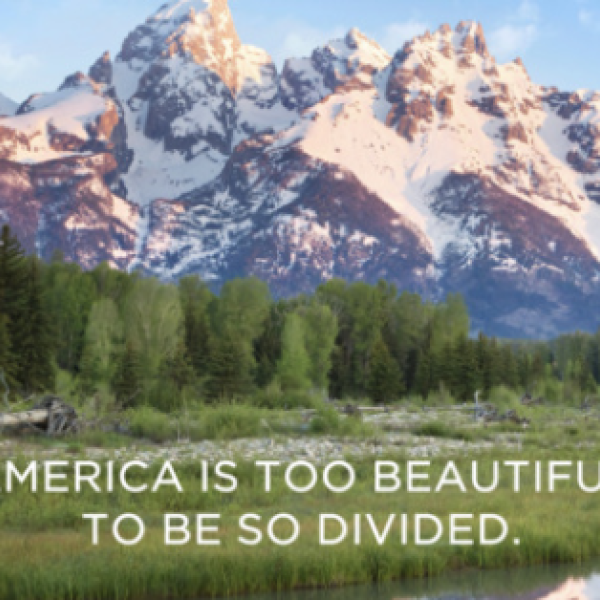 Rocky mountains with "America is too beautiful to be so divided" caption