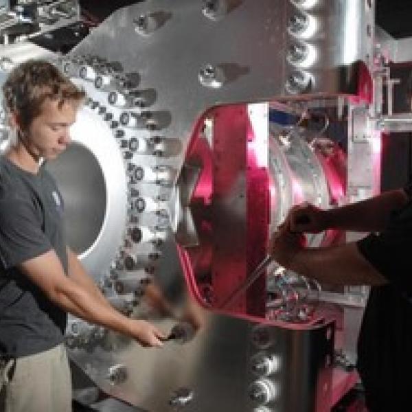 Post doc working on scientific equipment