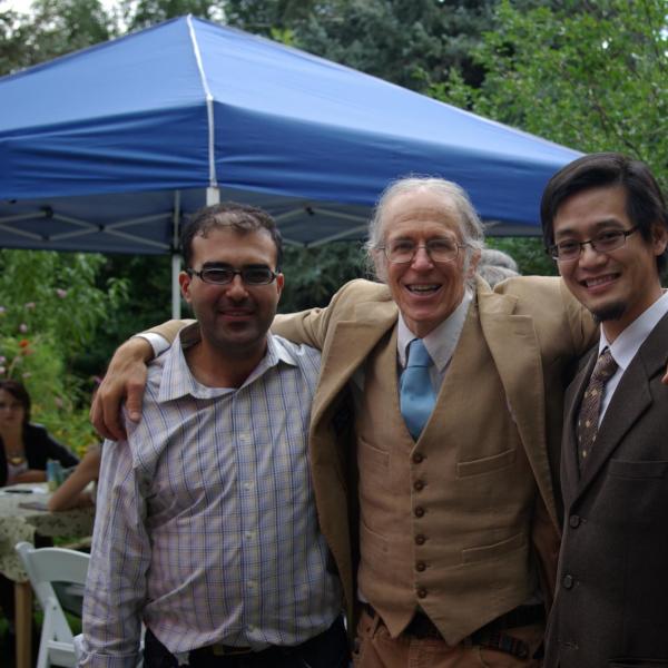 BFIS family member with two students
