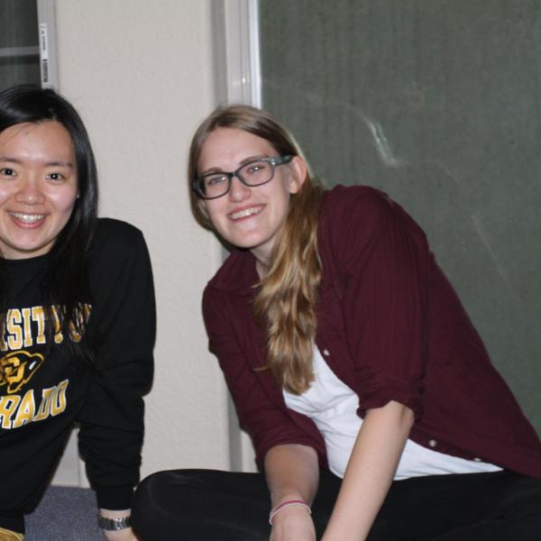 BFIS student and host sister sitting in front of window
