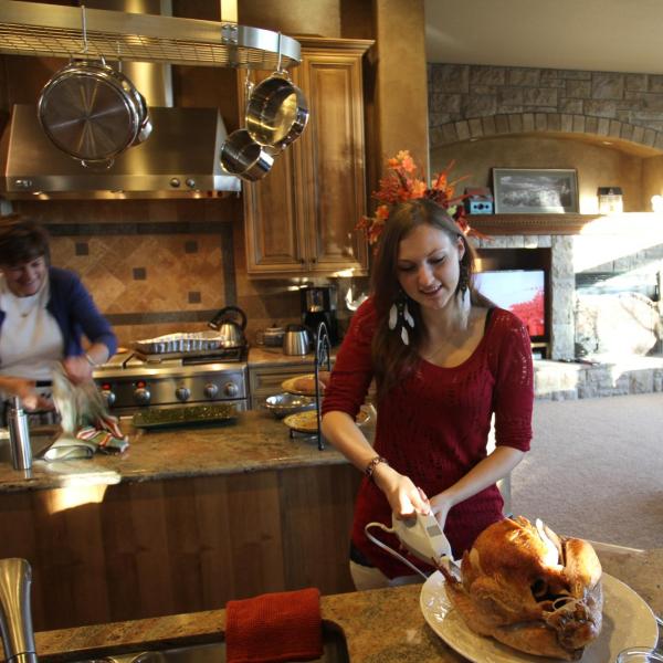 Student carving a turkey