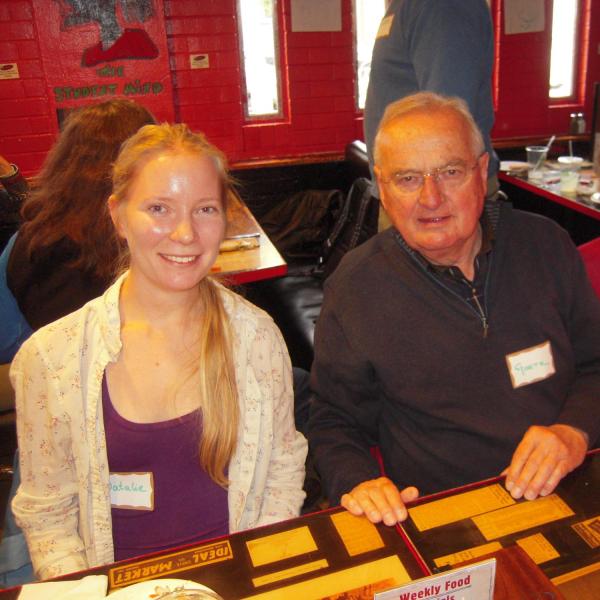 BFIS family and student sitting together at restaurant
