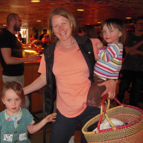 BFIS family standing and smiling at restaurant