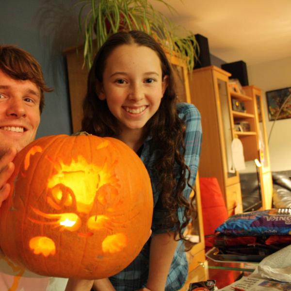 BFIS student and host sister with their carved pumpkin