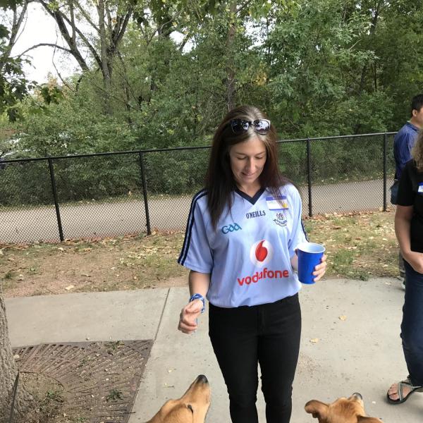 Two ISSS staff standing with food