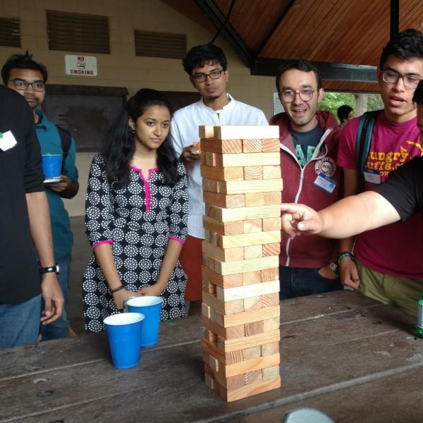 Group of students playing jenga