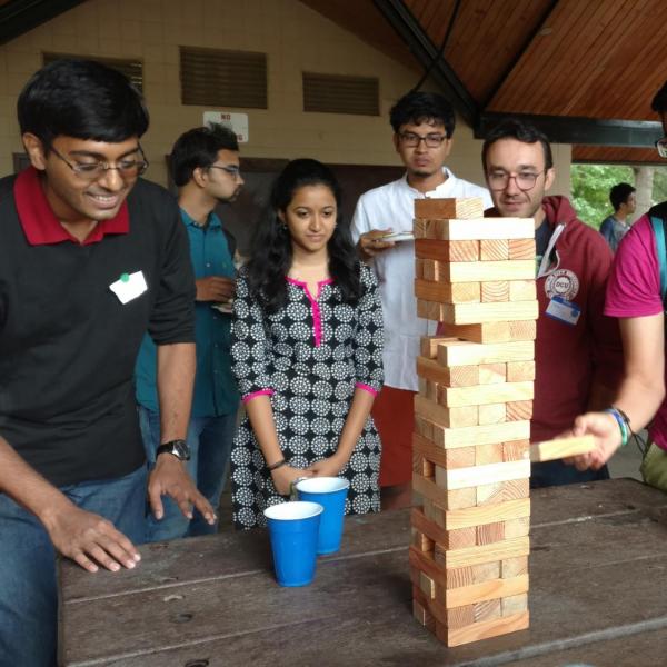 Group of students playing jenga